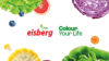 key visual of Eisberg consisting of the logo and a combination of different salads, veggies and fruit in a decorative way