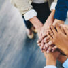 team shaking hands